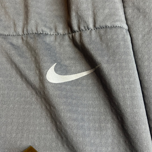 Nike Phenom Men's Dri-FIT Woven Running Pants in a smoke grey Dri-FIT technology - Picture 10 of 11